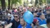 Protesters in Almaty rally to demand a fair election and the freeing of political prisoners on May 1.