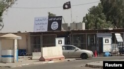 Իրաք - «Իսլամական պետության» դրոշը Մոսուլում, հուլիս, 2014թ․