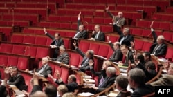 France -- Members of the French National Assembly vote an amendment, 22Dec2011 