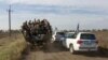 Представители ОБСЕ наблюдают, как украинские силы покидают свои позиции на переднем крае в районе села Богдановка 7 октября 2016