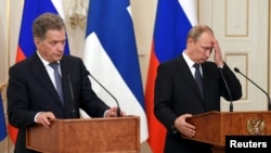 Russian President Vladimir Putin (right) with Finnish President Sauli Niinisto last month. 