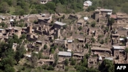 A photograph taken from a Pakistani army helicopter shows empty houses whose roofs have been removed by the army during an operation are seen in the South Waziristan tribal district on Pakistan's border with Afghanistan, May 2016.