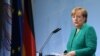 Канцлерка Нямеччыны Ангела Мэркель выступае на выніковай прэс-канфэрэнцыі саміту
