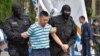 Dozens Detained In Kazakhstan Over Release Of Political Prisoners