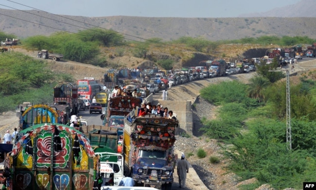 Civilians flee the fighting in North Waziristan in 2014.