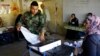 Suicide Bombing Strikes Ballot Warehouse In Iraq