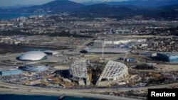 Under fire: an aerial view from March shows the Fisht Olympic Stadium (center) and other venues under construction for the 2014 Winter Olympic games in Sochi.