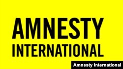 Amnesty International guramasynyň emblemasy