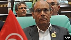 Tunisian President Moncef Marzouki denounced the attack in Libya as a "terrorist act."