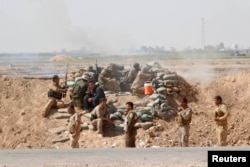 Позиции отрядов пешмерга вблизи иракского города Киркук. 30 сентября