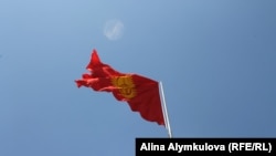 Kyrgyzstan - With the financial support of the ex-Prime Minister Omurbek Babanov updated national flag on a mountain on the outskirts of Bishkek. It is the largest flag of Kyrgyzstan. July 24, 2013