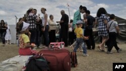 Беженцы с восточной Украины на российской границе