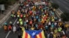 SPAIN -- Pro independence protesters march along a highway in San Vicenc dels Horts, October 18, 2019