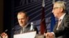 The president of the European Commission, Jean-Claude Juncker (right), and the president of the European Council, Donald Tusk, attend a final press conference at the end of the Riga summit on May 22.