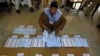 Afghan Candidates Protest Polls