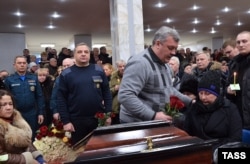 People attend a funeral for victims of the explosion in Vorkuta on February 29.