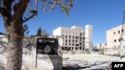 Разрушенный джихадистами квартал в сирийском городе Манбидж (архивное фото)