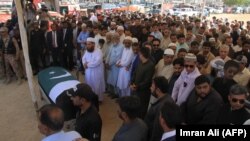 Relatives, residents and government officials offer funeral prayers for slain Pakistani exchange student Sabika Sheikh, who was killed during a school shooting in Texas, following her body's arrival from the United States in Karachi on May 23.