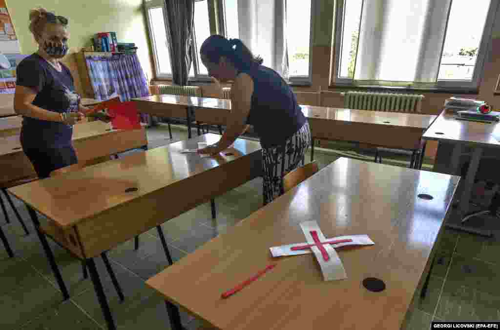 Teachers prepare a classroom for teaching in Skopje on September 1. The government made a decision to postpone the start of the school year due to the current state of the COVID-19 pandemic. It was decided that all schools will begin on October 1, with debate still taking place about how classrooms will be conducted.