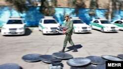 Iran – Satellite dishes removed from roofs and collected in a place among police cars in east Tehran, 21Feb2012 