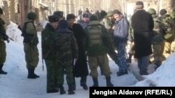 Residents and police gather in Uzbekistan's Sokh exclave on January 6.