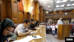 Suspected opposition supporters attend the latest session in their trial at the revolutionary court in Tehran on September 14, 2009