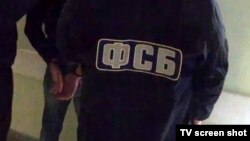To date, not a single Russian official or law enforcement agency has commented on the record about the reported case against the Federal Security Service (FSB) officers, identified as Sergei Mikhailov and Dmitry Dokuchayev, and other alleged accomplices. (illustrative photo)