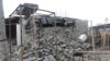 FILE: The aftermath of an earthquake in Tajikistan, December 2015.