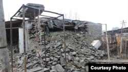 FILE: The aftermath of an earthquake in Tajikistan, December 2015.
