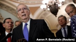 U.S. - Senate Majority Leader Mitch McConnell, accompanied by Sen. John Barasso (right-WY), Sen. Roy Blunt (right-MO) and Sen. Chuck Grassley (right-IA), speaks with reporters following leadership elections at the U.S. Capitol in Washington, U.S., Novembe