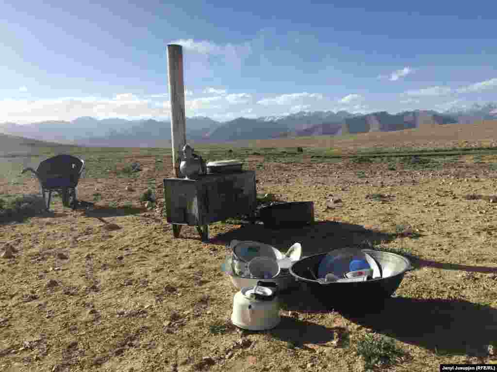 The kitchen... Life at the pasture is lived outside, the yurt serving mostly for eating and sleeping. At this altitude, the air pressure is lower so food takes longer to cook.