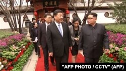 Средба на кинескиот претседател Кси Џинпинг со лидерот на Северна Кореја, Ким Џон Ун во март