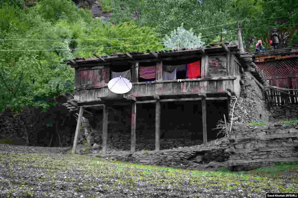 A satellite dish on a Kalash home. One local complained to Khattak about the lure of television, saying that during festivals many young Kalash stay at home, huddled around their TVs.