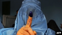 Some Afghans have dubbed the success of the election a "Purple Revolution" after the color of the indelible ink used to mark voters' fingers.