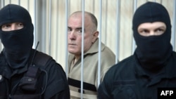 Бывший генерал полиции Украины Алексей Пукач в ходе вынесения вердикта по его делу. Киев, 29 января 2013 года. 
