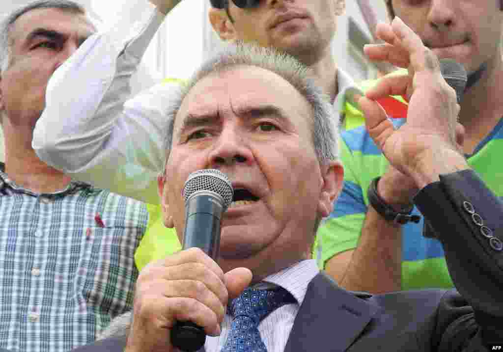 Hasanli, a respected Cold War historian and former lawmaker, has proved a charismatic public speaker, and frequently calls on supporters to vote to "end the dictatorship of one family in Azerbaijan." Here, he speaks at a Baku rally on September 22. 