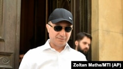 Former Prime Minister Nikola Gruevski leaves court after his extradition trial in Budapest on June 27, 2019.