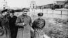 Soviet dictator Josef Stalin (center) and Soviet secret-police head Nikolai Yezhov (right) walk near Moscow in 1937, the same year Yezhov signed Order No. 00447, which began the Great Terror.