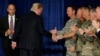 U.S. President Donald Trump shakes hands with military officers as he departs after announcing his strategy for the war in Afghanistan during an address to the nation from Fort Myer, Virginia, U.S., August 21, 2017.