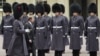 Havel inspects the Royal Guard during a visit to Buckingham Palace, London, in March 1990. (Michal Krumphanzl)