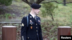 U.S. Army Sergeant Bowe Bergdahl (right) leaves a courthouse after an arraignment hearing for his court-martial in Fort Bragg, North Carolina, in December 2015.