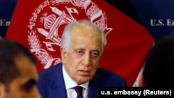 U.S. special envoy for peace in Afghanistan, Zalmay Khalilzad, talks with local reporters at the U.S. embassy in Kabul in November.