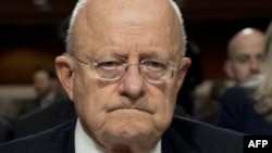 U.S. National Intelligence Director James Clappe testifies during a Senate Armed Services Committee hearing on Capitol Hill in Washington on February 9.