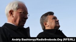 Експрезидент України Віктор Янукович та експрем'єр-міністр Микола Азаров, Київ, 3 жовтня 2011 року