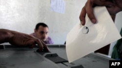 На парламентских выборах в Сирии. Дамаск, 7 мая 2012 года. 