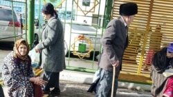 Pensioners at a bus stop in Lebap, Turkmenistan (file photo)