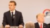 France, Paris, French President Emmanuel Macron delivers a speech as U.S. President Donald Trump looks on, before a lunch at the Elysee Palace, during commemorations for Armistice Day 11nov2018