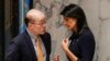 U.S. Ambassador to the United Nations Nikki Haley (R) confers with Chinese Ambassador to the UN Liu Jieyi