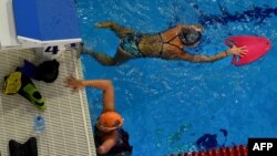 Russia -- Members of Russia's Paralympic national team, swim during a training session in the town of Ruza, August 18, 2016