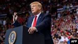 US President Donald Trump gestures as he speaks during a "Make America Great Again" campaign rally in Cincinnati, Ohio, on August 1, 2019. 